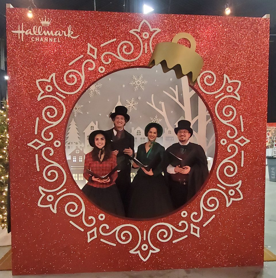 The Village Carolers singing at Hallmark ChristmasCon