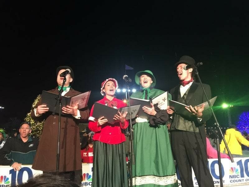 The Village Carolers singing at RiverRink