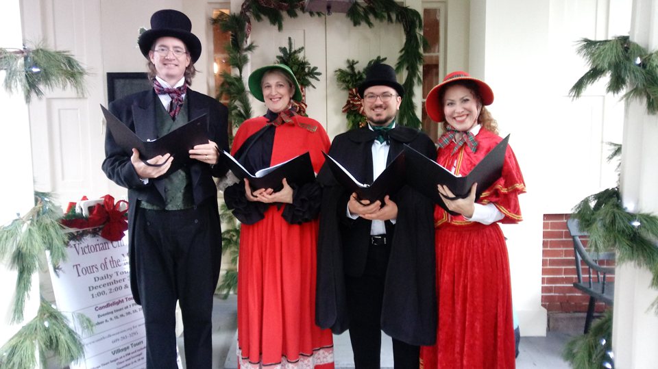 The Village Carolers singing at Historic Smithville Mansion