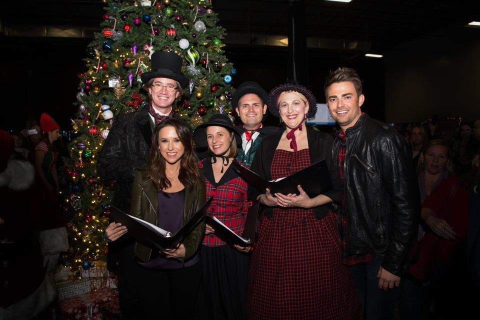The Village Carolers singing at ChristmasCon