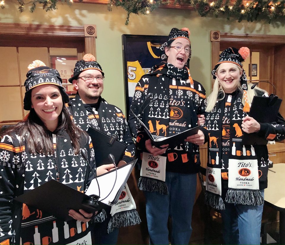 The Village Carolers singing for Tito's Vodka