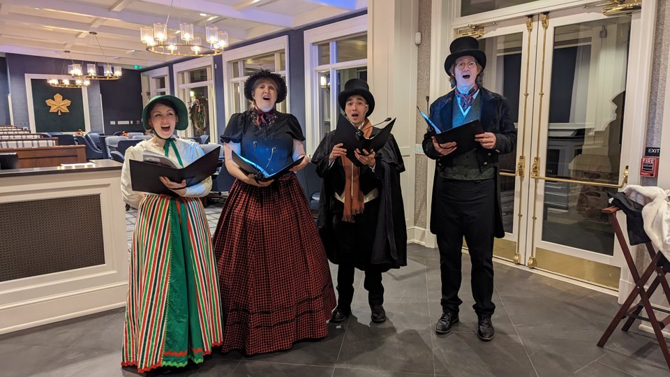 The Village Carolers singing