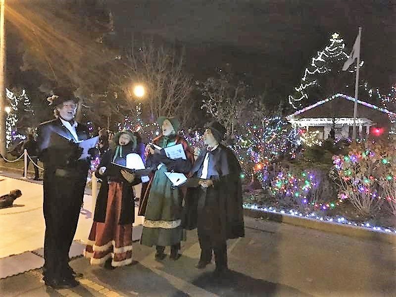 The Village Carolers singing